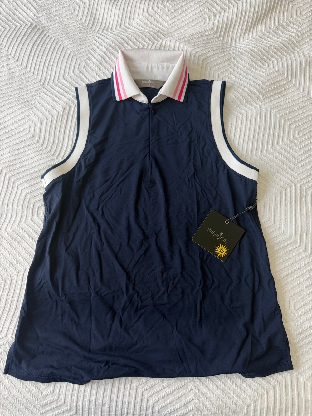 Belyn Key Navy Sleeveless Polo with White and Pink Trim